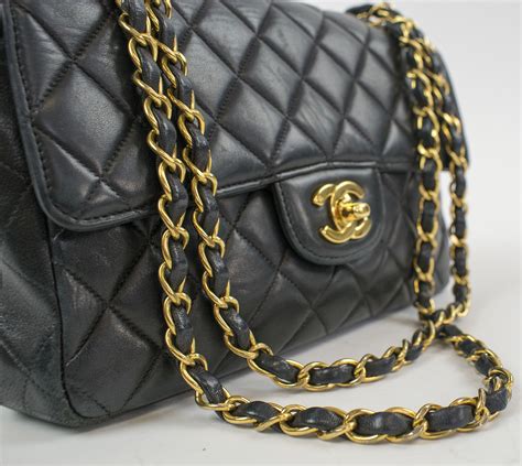 black chanel purse with gold chain|chanel black handbag chain strap.